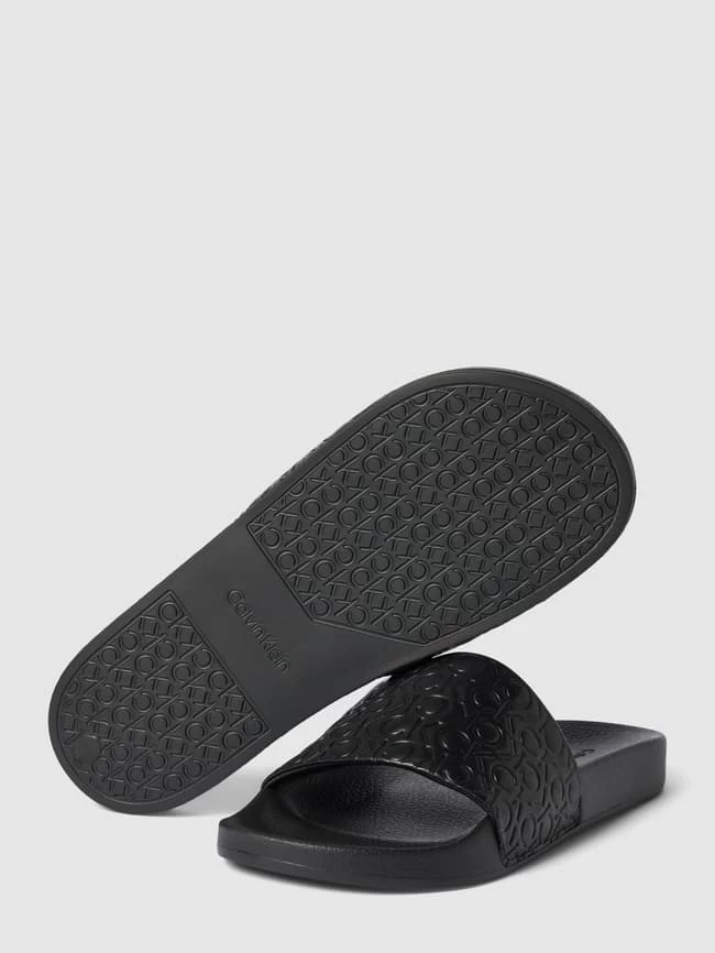 Calvin Klein Underwear Slides Mit Allover-Muster Aus Monogrammen Modell 'POOL' - Schwarz 7 Calvin Klein Underwear Slides Mit Allover-Muster Aus Monogrammen Modell 'POOL' - Schwarz – Bild 5